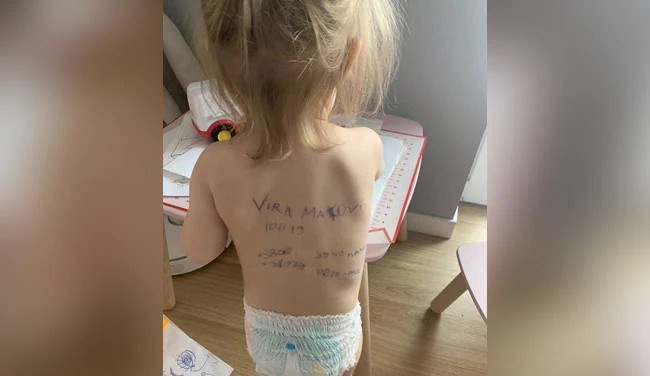 "Heartbreaking": Ukrainian Mommy Writes Household Details On Young child's Back