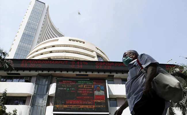 Sensex, Nifty Slip Into Red In The Middle Of Volatile Profession; IT Stocks Drag