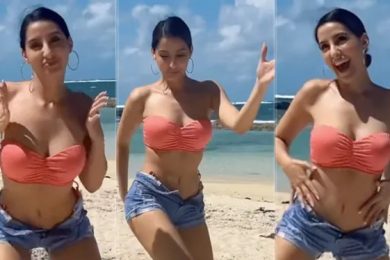 Nora Fatehi's Dance Moves Only Get Stylishly Better By The Beach In A Pink Swim Set, Denim Shorts
