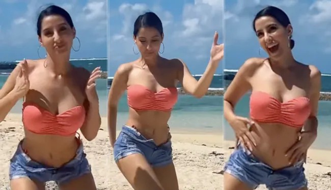 Nora Fatehi's Dance Moves Only Get Stylishly Better By The Beach In A Pink Swim Set, Denim Shorts