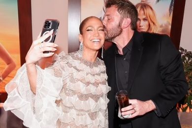 Jennifer Lopez receives a kiss from her proud husband Ben Affleck as she shares a glimpse of the wild afterparty following Shotgun Wedding premiere